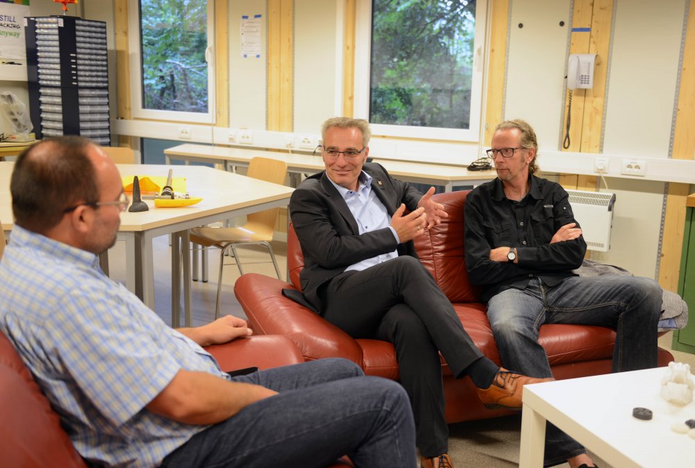 Tim Brockmann im Gespräch mit Prof. Dr. Torsten Steffen und Axel Grimm.