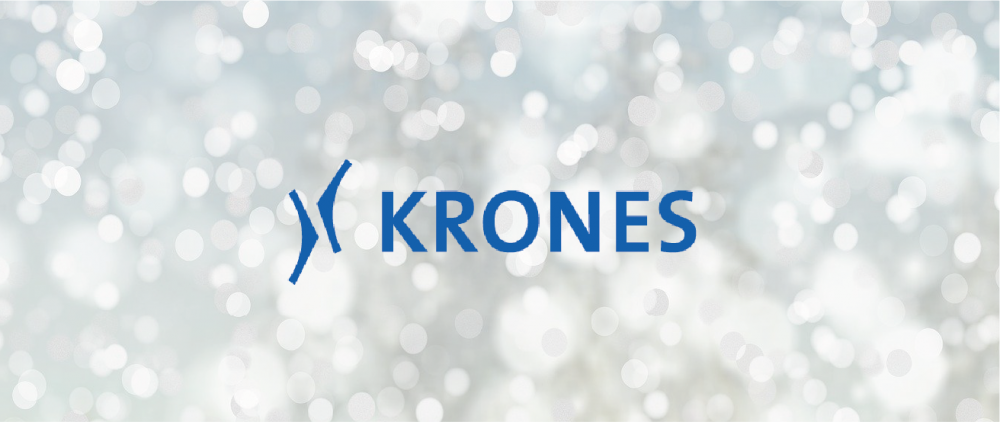 Weihnachtlicher Hintergrund mit Krones AG-Firmenlogo drauf.