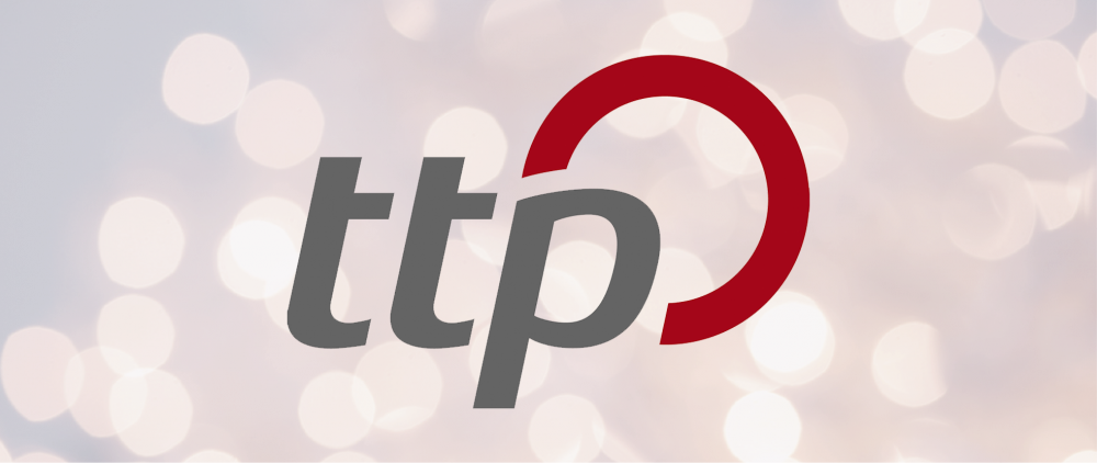 Weihnachtlicher Hintergrund mit ttp-Firmenlogo drauf.