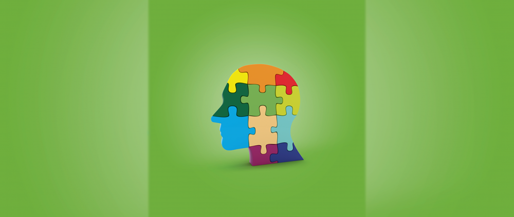 Grafik: Kopf im Profil, zusammengesetzt aus bunten Puzzlestücken.