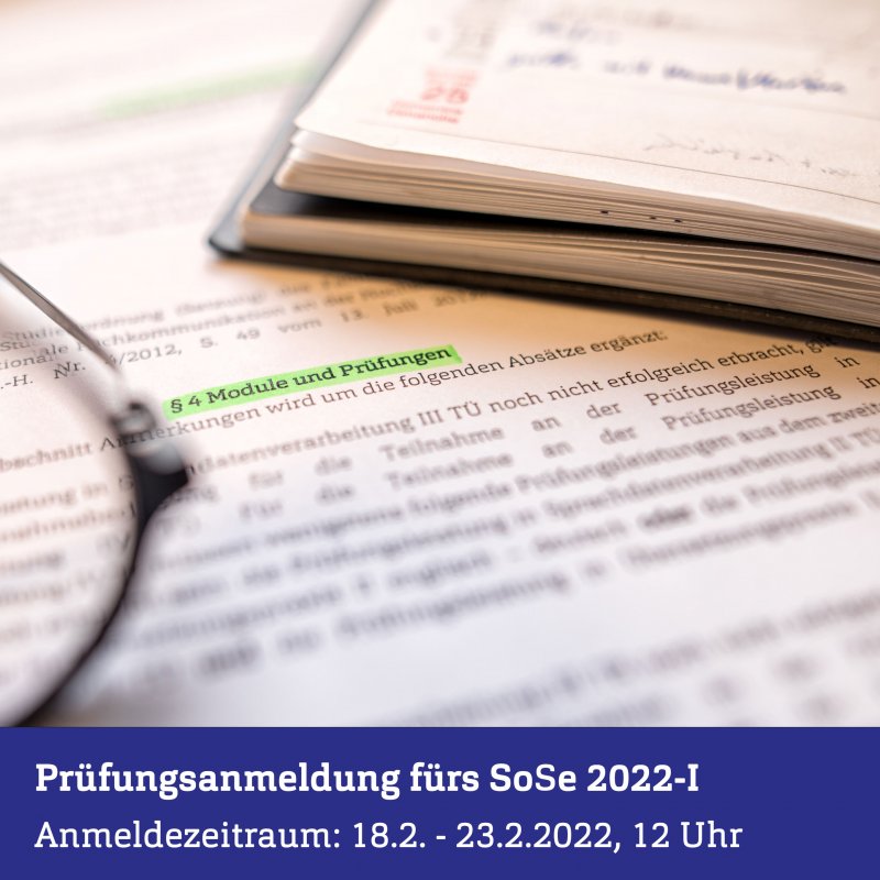 Ein Dokument, darauf, angeschnitten zu erkennen, ein Buch und eine Brille.