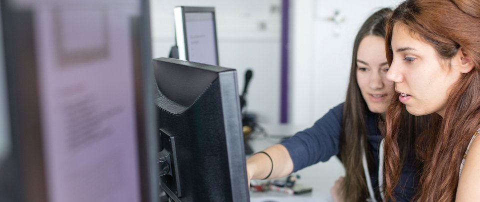 Students working in a computer lab.