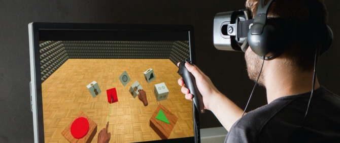 User uses a head-mounted display and a 3D game controller for sound mixing in a virtual reality environment